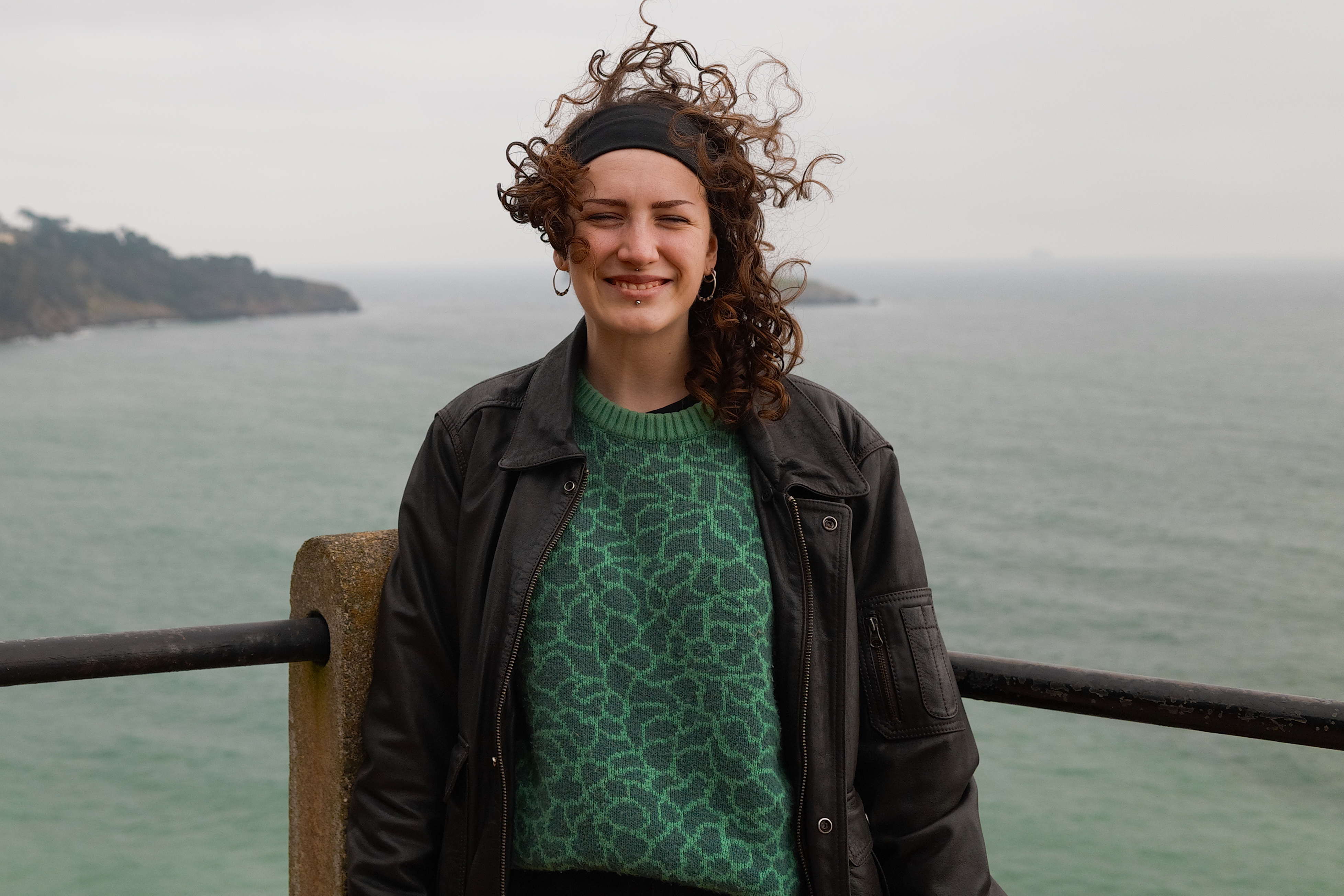 A photo of a woman smiling, taken on a Sigma BF camera