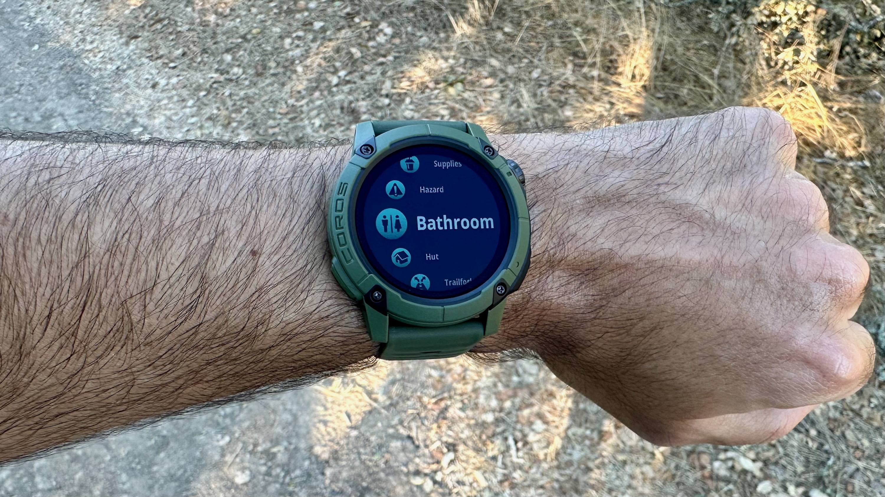 A list of pins on the COROS NOMAD for a hiking activity, including bathroom, hazard, hut, supplies, and trailfork.