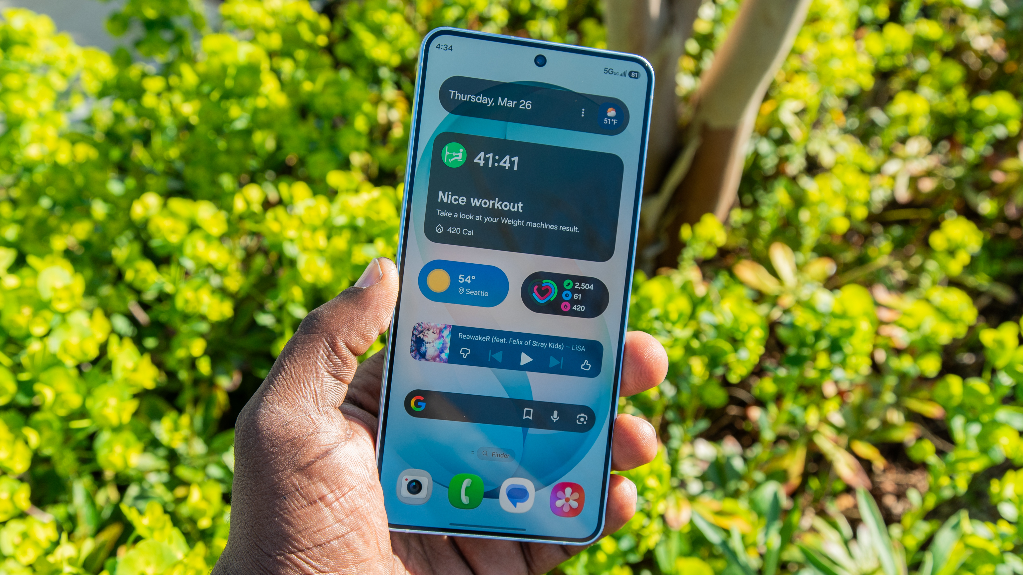 Holding the Galaxy S26 Plus outside