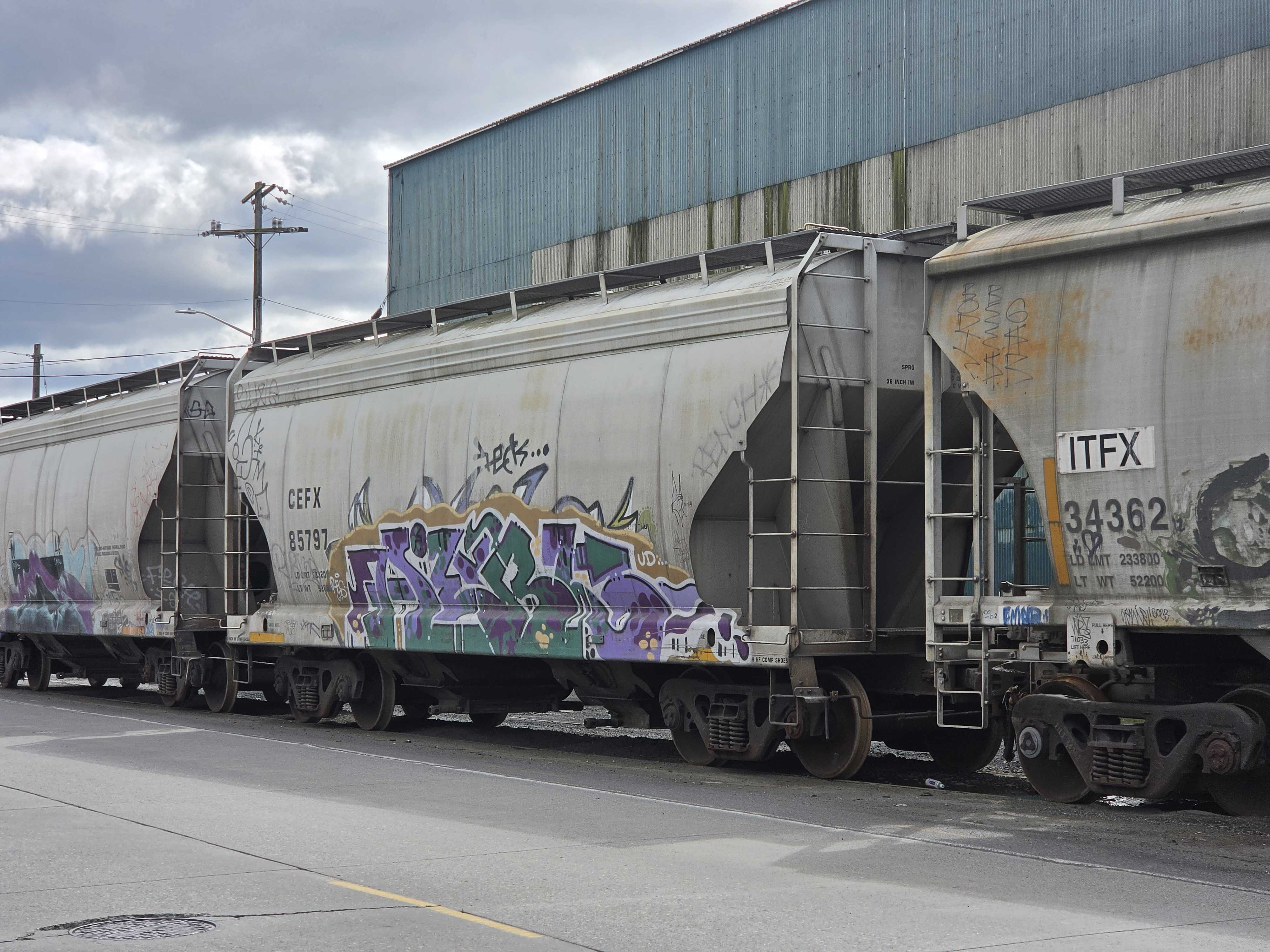 A train car with graffiti (3x)